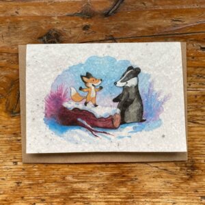 Une carte postale à planter pour Noël. Motif petit renard dans la neige.